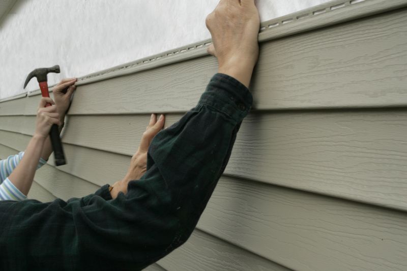 Inspecting Repaired Vinyl Siding